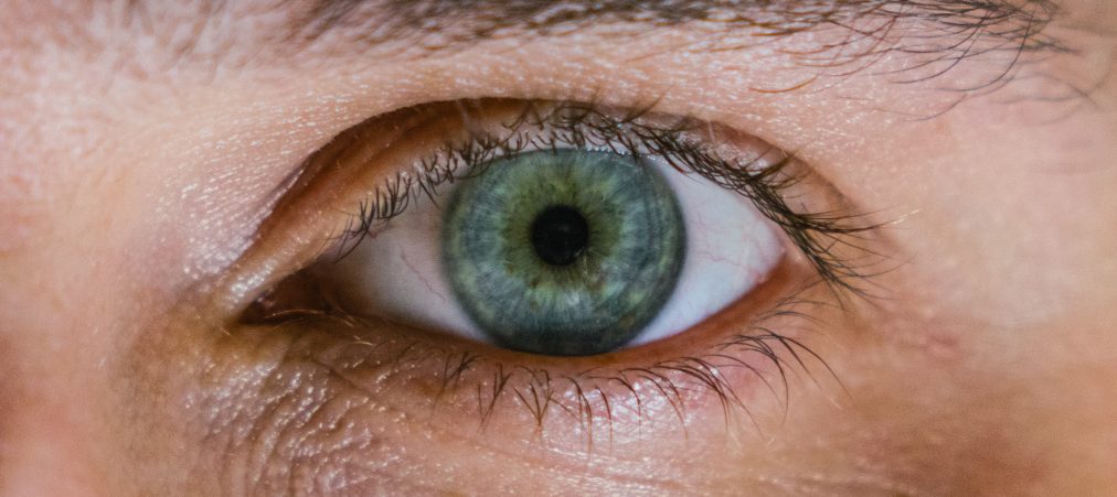 Closeup of an eye looking ahead.